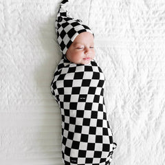 Swaddle measures 44 by 44 inches for secure newborn swaddling and versatile use.