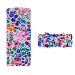 Little Sleepies swaddle in Sweet Pea showing buttery softness for cozy newborn cuddles.