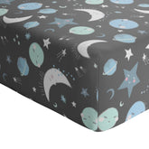 Little Sleepies crib sheet showing elastic band for secure, snug fit.