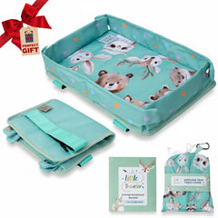 Little Traveler waterproof airplane tray cover shows forest pattern for clean flights