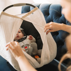 Little Unicorn tan gingham fabric canopy in soft, machine-washable material.
