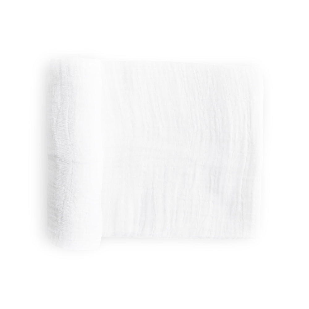 Little Unicorn cotton muslin swaddle with galaxy design offers breathable softness for naps.