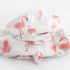 Little Unicorn Deluxe Muslin Quilt stroller-on-the-go quilt for travel and in-car comfort.