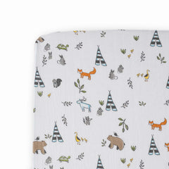Little Unicorn Forest Friends crib sheet flatlay showcases breathable muslin softness