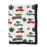 Little Unicorn four-layer muslin cuddle quilt offers soft warmth for newborn cuddles.