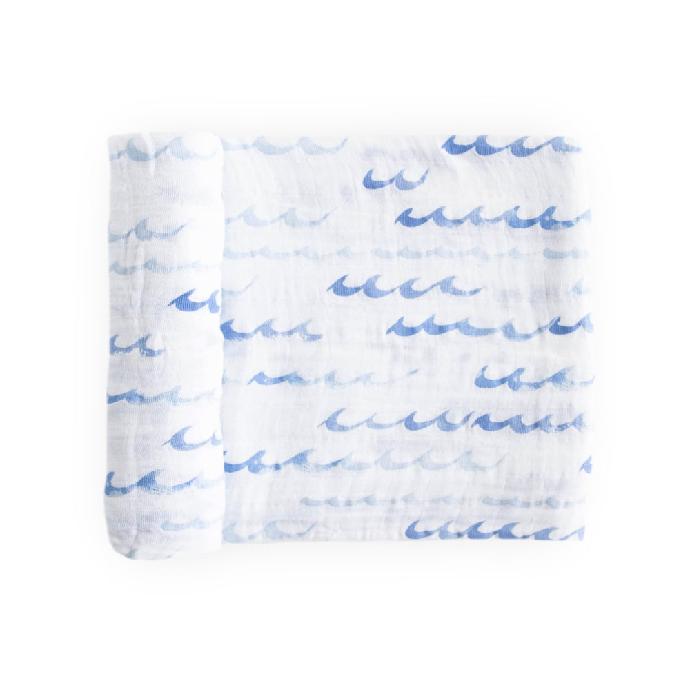 Little Unicorn galaxy design swaddle offers breathable, secure wrap for baby comfort.