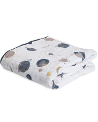Little Unicorn quilt in crib or nursery creates a gentle bedtime ambience