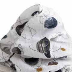 Close-up of Little Unicorn muslin swaddle cotton texture, soft and gentle touch.