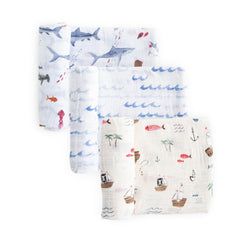 Little Unicorn muslin swaddle with galaxy design for breathable warmth and snug newborn comfort.