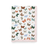 Little Unicorn newborn receiving quilt with butterfly print offers soft, breathable comfort for nap time.