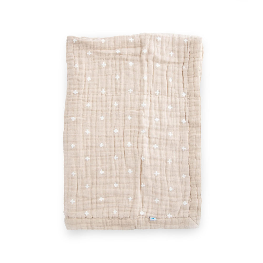Little Unicorn newborn receiving quilt front view, taupe cross design for cozy snuggles.