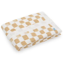 Close-up of ultra-soft muslin texture from Little Unicorn quilt, breathable and cozy.