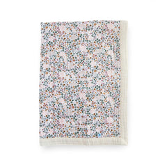 Little Unicorn newborn receiving quilt in soft muslin fabric for gentle everyday cuddles.