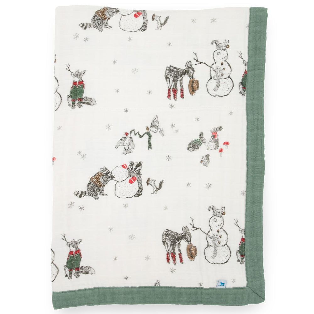 Little Unicorn newborn quilt — soft muslin front for cozy cuddles.