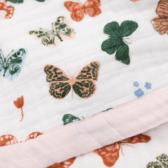 Little Unicorn newborn quilt folds compactly for travel, car seats, and daycare.