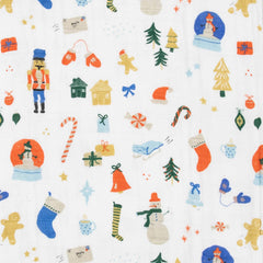 Little Unicorn travel-friendly quilt ready as a stroller cover or on-the-go comfort