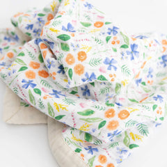 Little Unicorn on-the-go blanket; stroller cover for travel-friendly comfort.