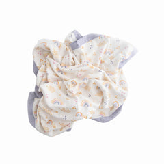Little Unicorn Rainbows & Raindrops Deluxe Muslin Quilt offers tummy-time softness with bamboo rayon