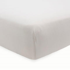 Little Unicorn stretch-knit crib sheet Pebble maintains a snug fit on standard cribs