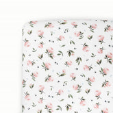 Little Unicorn stretch knit crib sheet in Watercolor Rose offers a soft, snug fit.