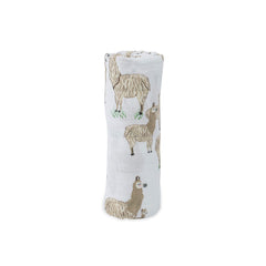 Little Unicorn llama design swaddle used as a stroller cover for on-the-go comfort.