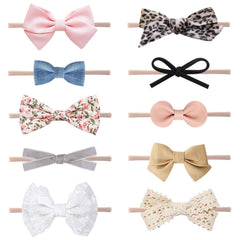 LittleJoJo pink sailor bow on soft nylon headband for delicate newborn styling