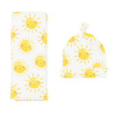 Little Sleepies Sunshine swaddle blanket spread in soft bamboo fabric for newborn comfort