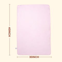 Littogoose Baby Comforter in crib-size 30x40 is laid ready for use.