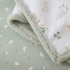 Living Textiles Goosey Goosey sherpa blanket back view shows plush sherpa warmth for snuggly naps