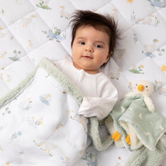Living Textiles Goosey Goosey sherpa blanket in crib demonstrates nursery-ready comfort