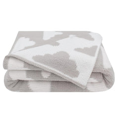 Living Textiles Grey Clouds blanket close-up highlights durable, cozy fabric for daily use