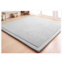 Loartee nursery rug showcases coral velvet softness for a gentle play surface.
