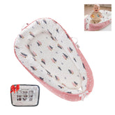 Loevin baby lounger forest pink with handles for easy transport.