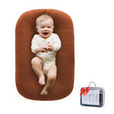 Loevin baby lounger with a soft cotton cover for gentle, breathable newborn lounging.