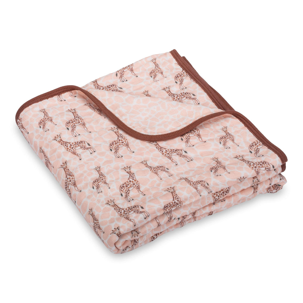 LollyBanks giraffe-print muslin blanket designed for nap time and play.