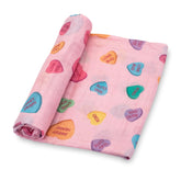 LollyBanks heart print muslin swaddle close-up for cozy newborn swaddling.