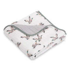 LollyBanks muslin baby blanket with duck print offers cozy warmth for newborns.