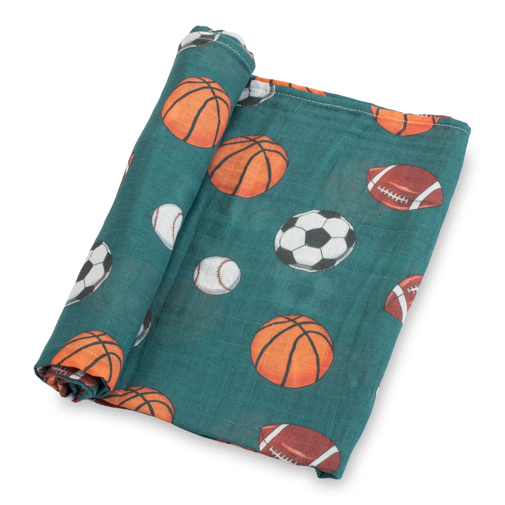 LollyBanks Muslin Swaddle with sports print for lightweight, comfortable wrapping.