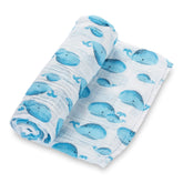LollyBanks whale-print muslin swaddle blanket for breathable baby comfort.