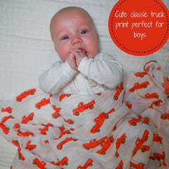 Baby wrapped in LollyBanks muslin swaddle blanket highlighting gentle warmth and security.