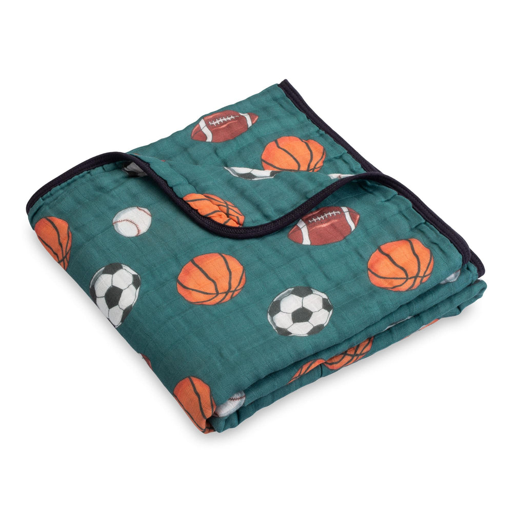 LollyBanks sports adventure blanket with balls print, ideal for nursery cuddles.