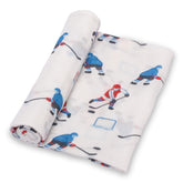 LollyBanks swaddle blanket in ice hockey print, cozy wrap for baby comfort