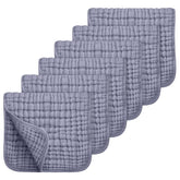 Looxii Muslin Burp Cloths softness close-up showing gentle 100% cotton texture for babies.