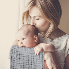 Looxii Muslin Burp Cloths in use during feeding provide absorbent protection
