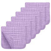 Looxii muslin burp cloths show soft texture for gentle baby care.