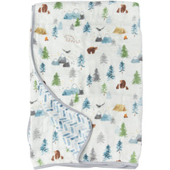 Loulou Lollipop muslin quilt blanket crib setup shows breathable Tanboocel fabric for safe naps.