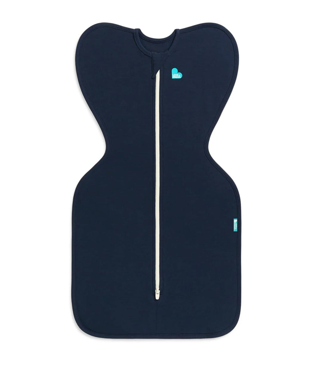 Love to Dream Swaddle Up arms-up navy sleep sack showing self-soothing design.