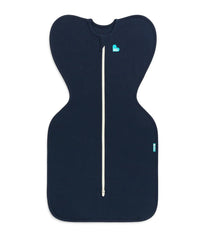 Love to Dream Swaddle Up arms-up navy sleep sack showing self-soothing design.
