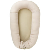 LOVE MAGE baby lounger in soft cotton for gentle comfort during supervised play.