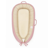 Love Mage infant lounger front view pink shows breathable cotton for gentle newborn comfort